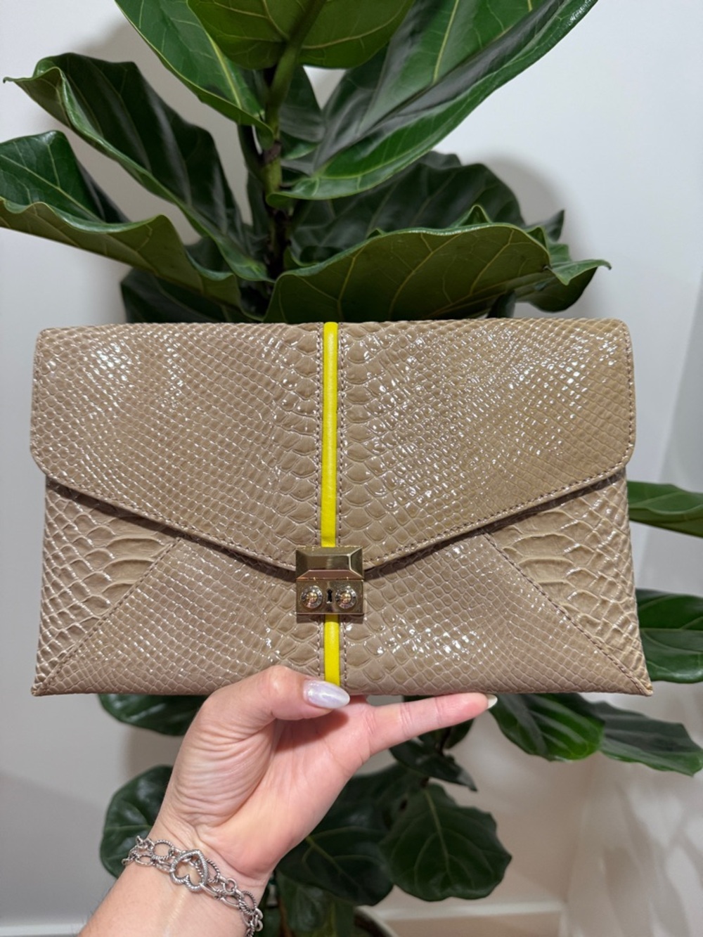 henri bendel Taupe Snake-Embossed Clutch with Yellow Stripe